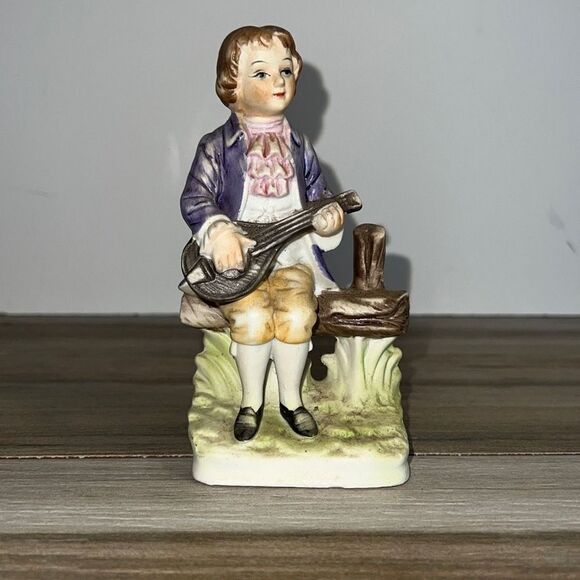 Vintage Norleans Taiwan Victorian Boy on fence 5.5" Porcelain Figurine - Picture 1 of 11
